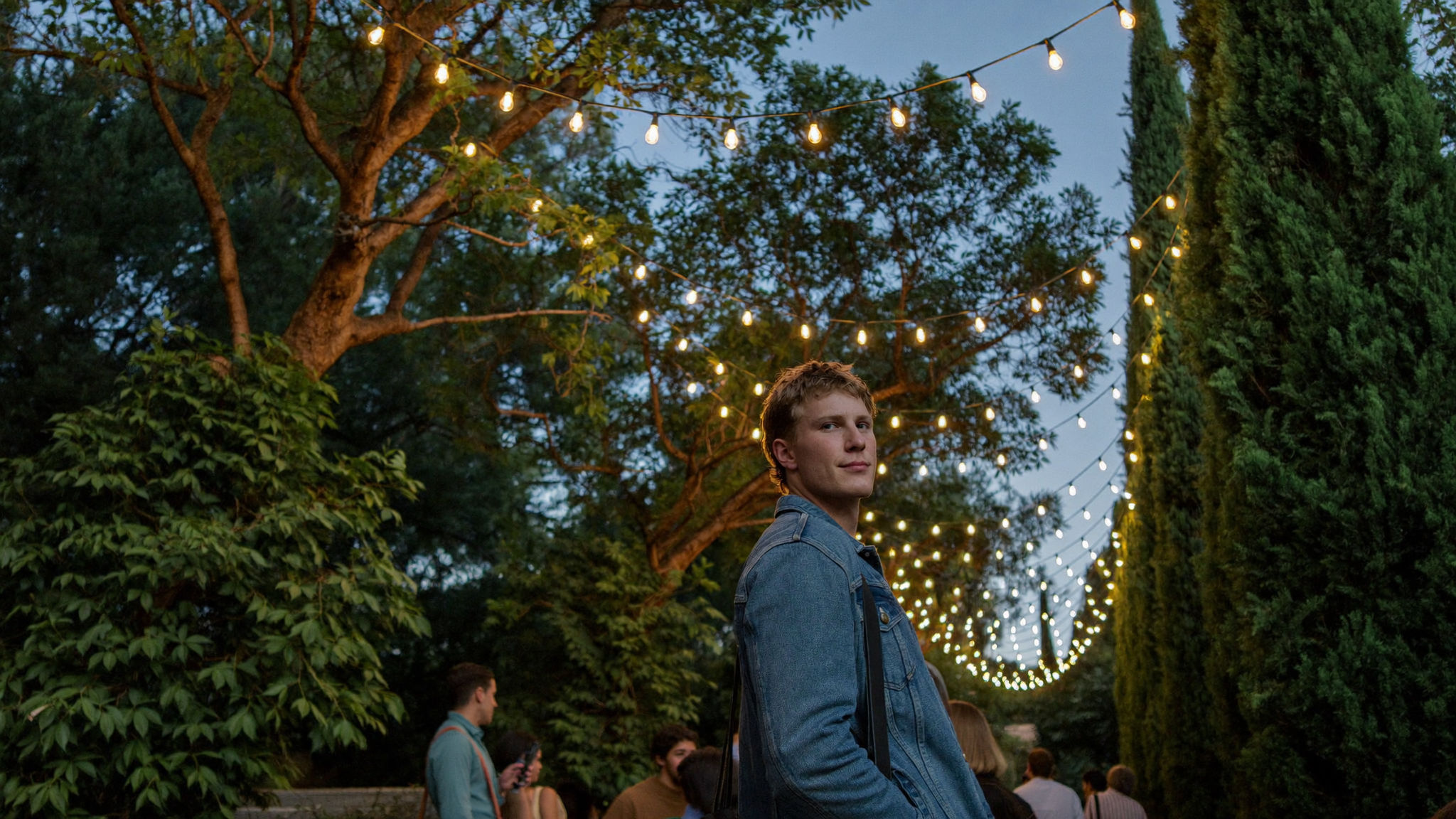 Original photograph, man, string lights, evening, without Halobloom