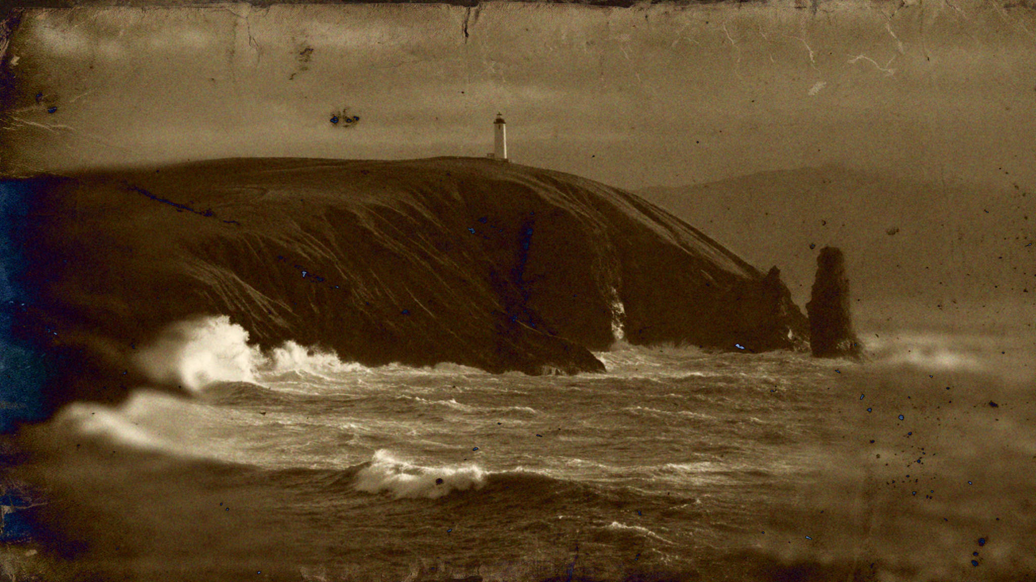 Stormy coast lighthouse after Halobloom: Old Photo