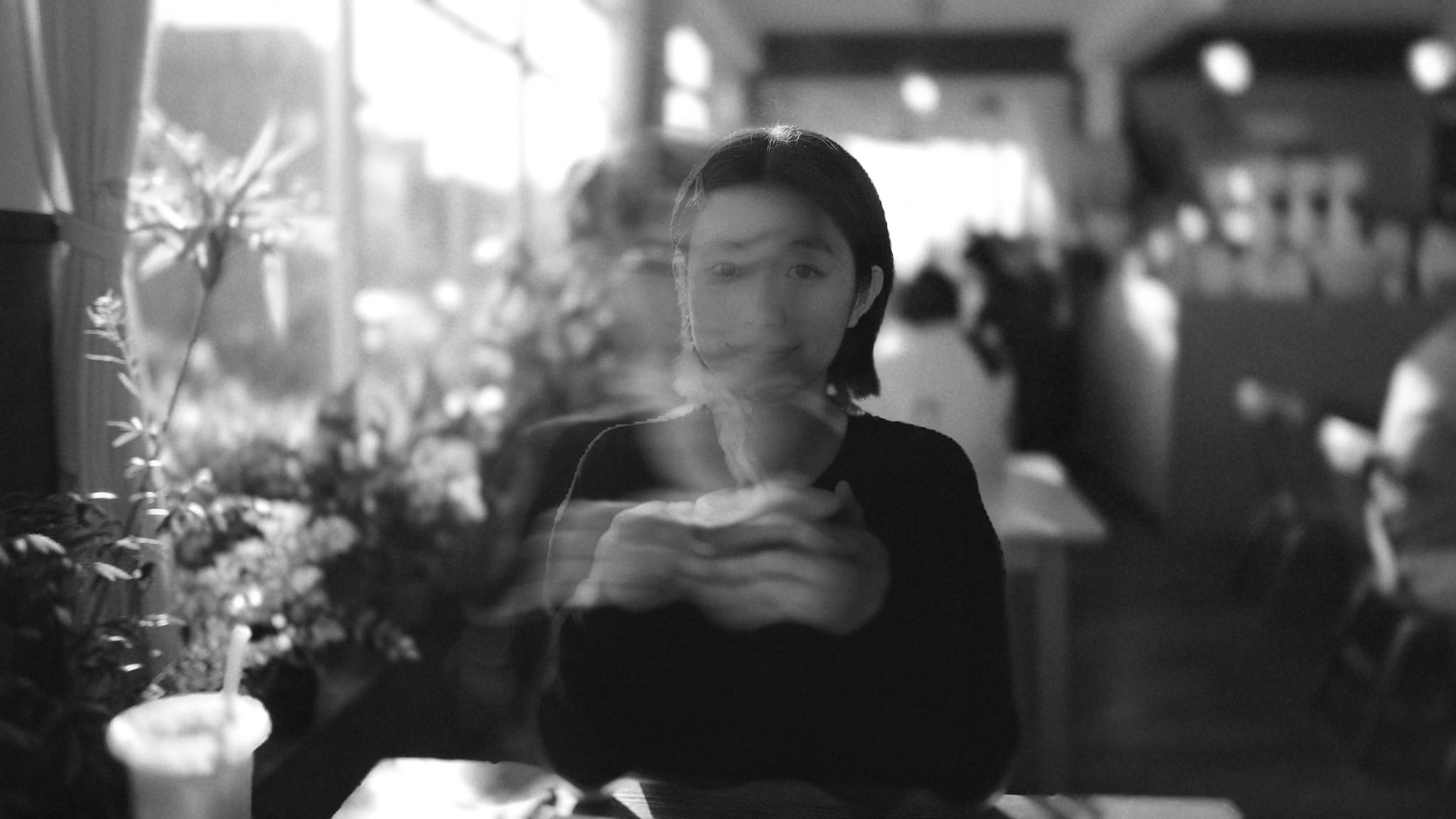 Cafe window portrait after Halobloom: Film Grain, Lens Blur, Long Exposure